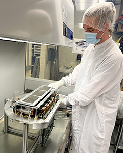 Dr. James Tutt assembling the tREXS focal plane camera in the lab cleanroom.