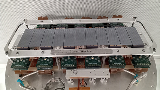 The assembled tREXS focal plane camera. The camera consists of 11 e2v CIS113 - Vega sensor tiled into a 300 x 75 mm camera. The readout electronics were also developed at Penn State University.